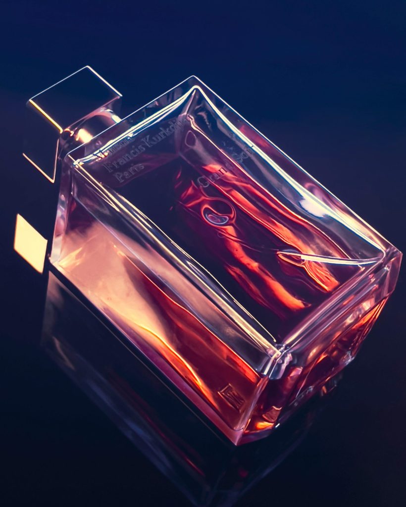 Perfume bottle with deep red liquid inside